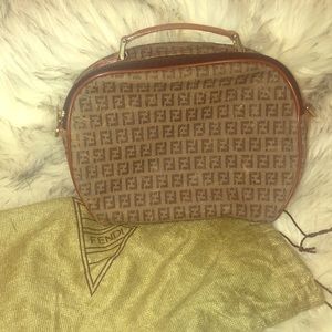 Vintage Fendi purse and duster